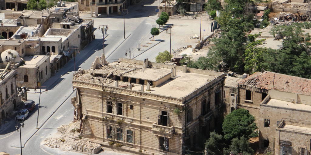 Aleppo, Syria. Buildings with damage and rubble. 